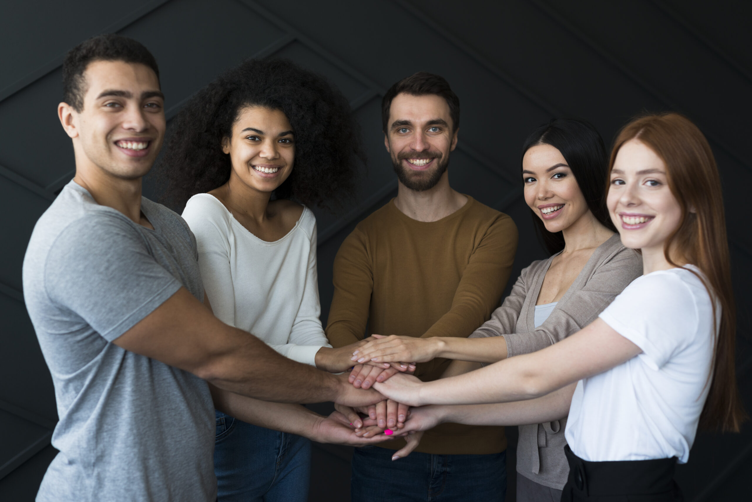 front-view-group-young-people-holding-hands front-view-group-young-people-holding-hands